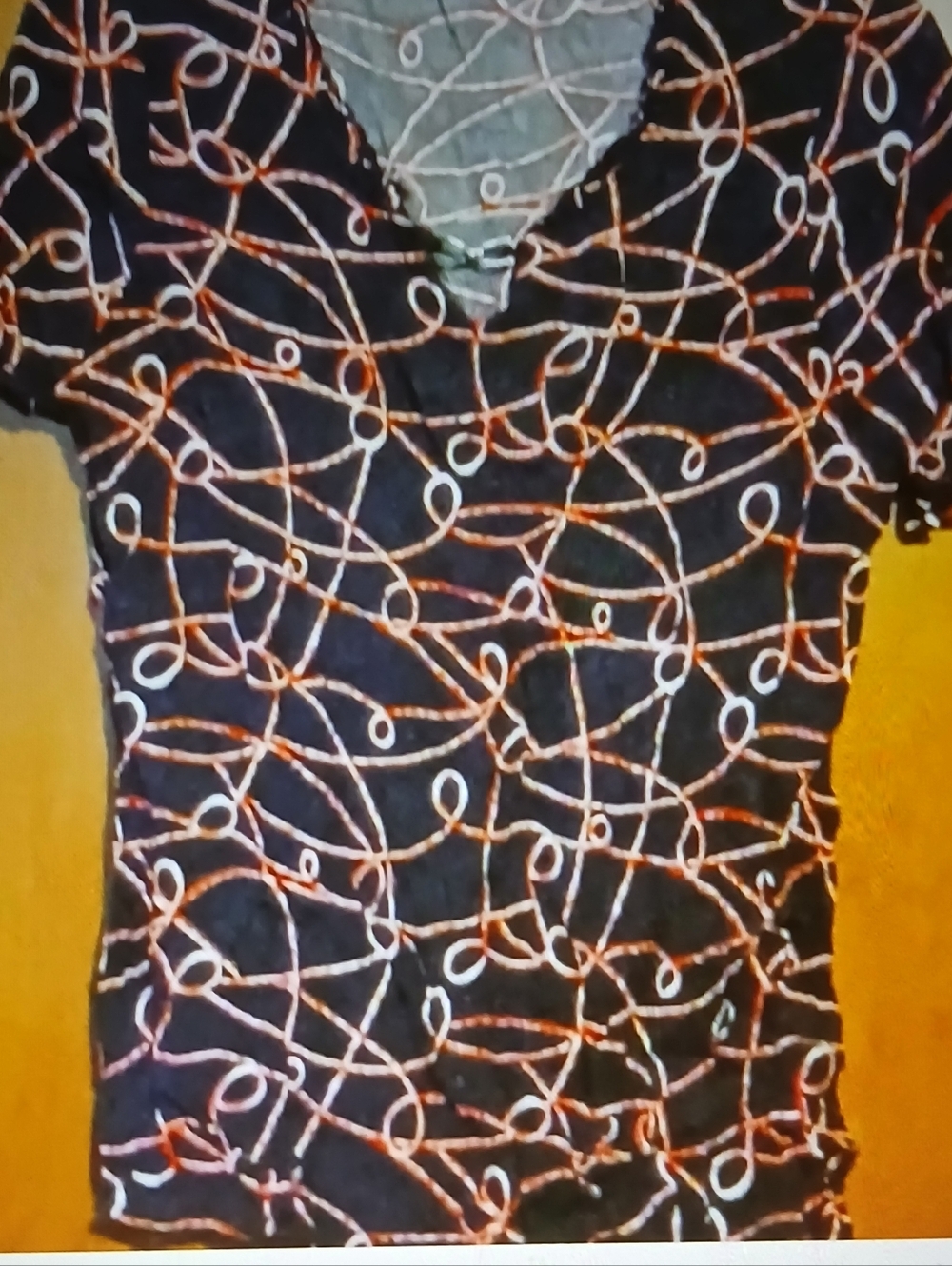 Sag Harbor Black Short-Sleeve V-Neck Top with Orange and White Loop Print